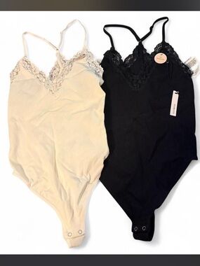 2 seamless lace-trim bodysuits from Forever 21 black and white size M/L NWT